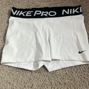 nike pros size medium